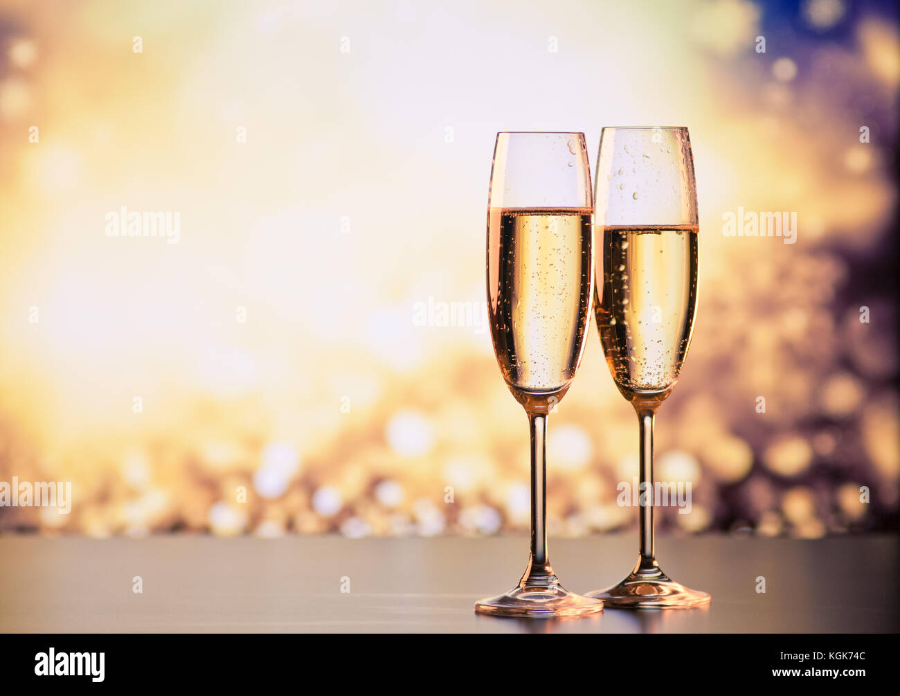 two champagne glasses ready to bring in the New Year Stock Photo - Alamy