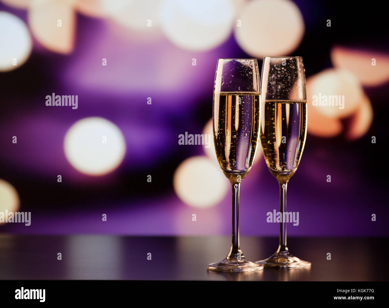 two champagne glasses ready to bring in the New Year Stock Photo - Alamy