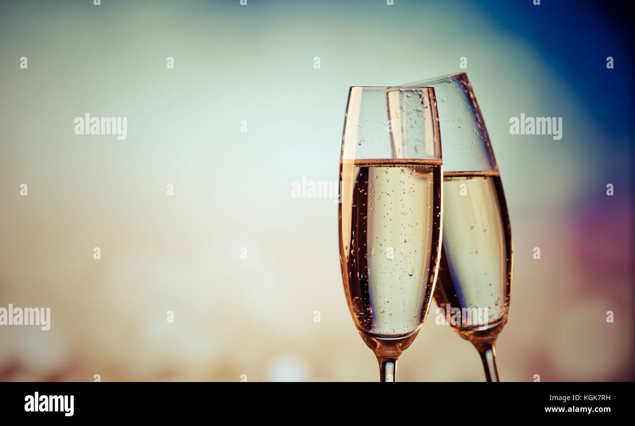two champagne glasses ready to bring in the New Year Stock Photo - Alamy