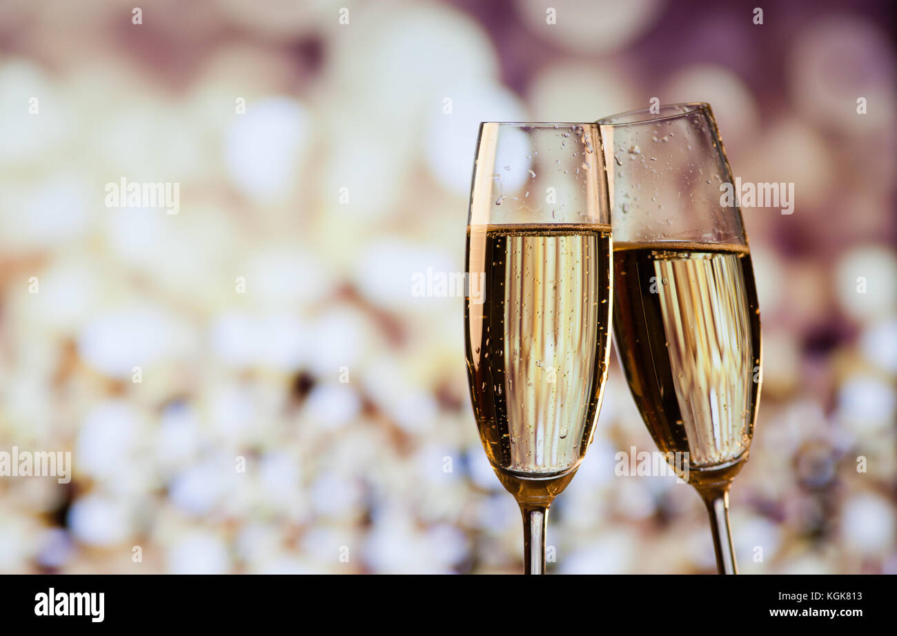 two champagne glasses ready to bring in the New Year Stock Photo - Alamy