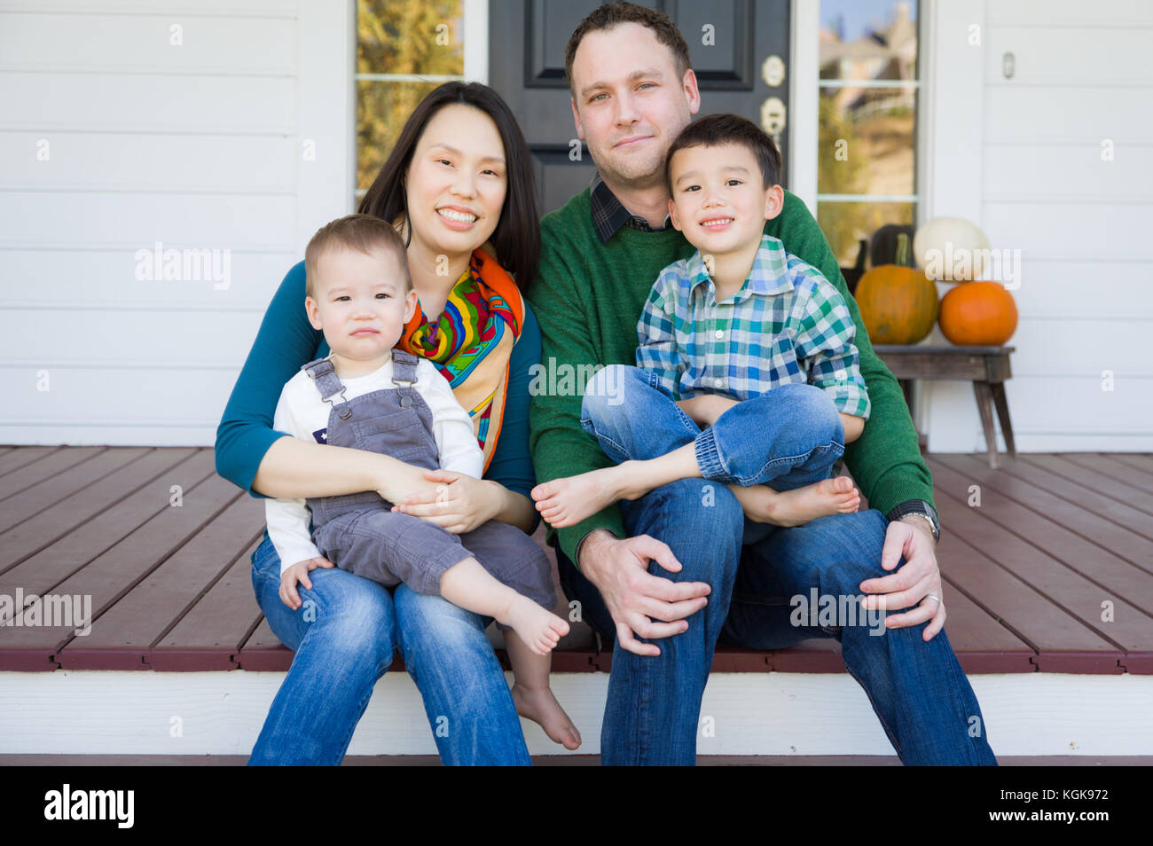 Mixed Race Chinese and Caucasian Young Family Portrait Stock Photo