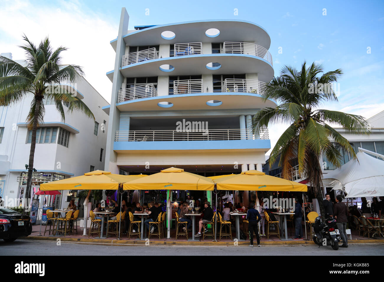 Cool Art Deco building with colorful cafe and restaurant out front on Ocean Drive in South Beach, Miami, Florida, USA. Stock Photo