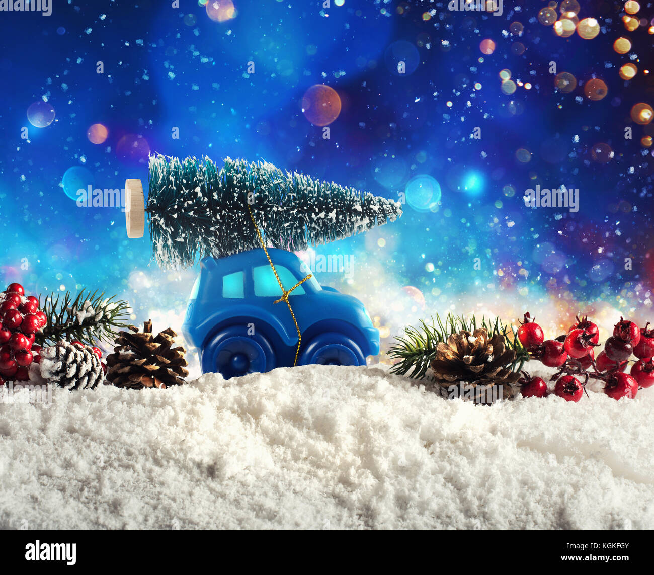 Toy Car that transport a Christmas tree Stock Photo Alamy