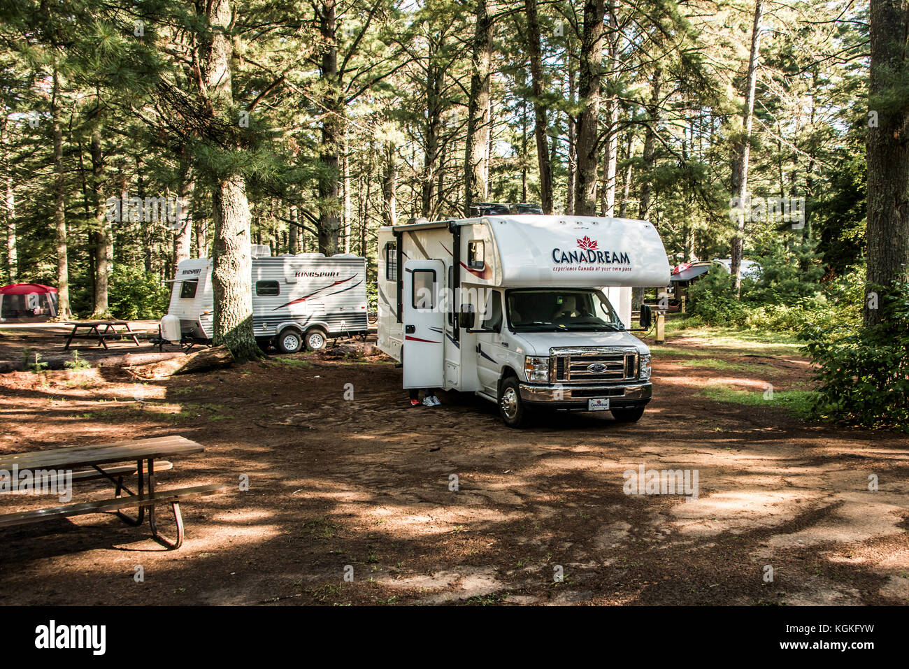 Canada Ontario Algonquin National Park 30.09.2017 - Parked RV camper car at Lake of two rivers Campground Beautiful natural forest Canadream Stock Photo