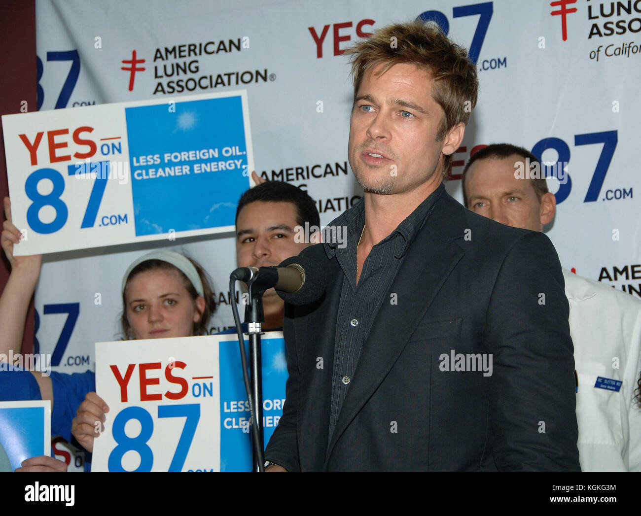 Brad Pitt and Los Angeles mayor Antonio Villaraigosa  at the L.A. Labor Headquarters for a get out and vote YES on 87.  headshot full length smile Brad Pitt 011  = Brad Pitt attending, People, Vertical, USA, Los Angeles, Actor, Film Premiere,  Photography, Red Carpet Event, Brad Pitt - Actor, Arts Culture and Entertainment, , Celebrities, Stock Photo