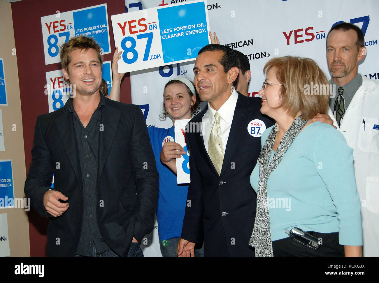 Brad Pitt and Los Angeles mayor Antonio Villaraigosa  at the L.A. Labor Headquarters for a get out and vote YES on 87.  headshot full length smile Brad Pitt 012  = Brad Pitt attending, People, Vertical, USA, Los Angeles, Actor, Film Premiere,  Photography, Red Carpet Event, Brad Pitt - Actor, Arts Culture and Entertainment, , Celebrities, Stock Photo