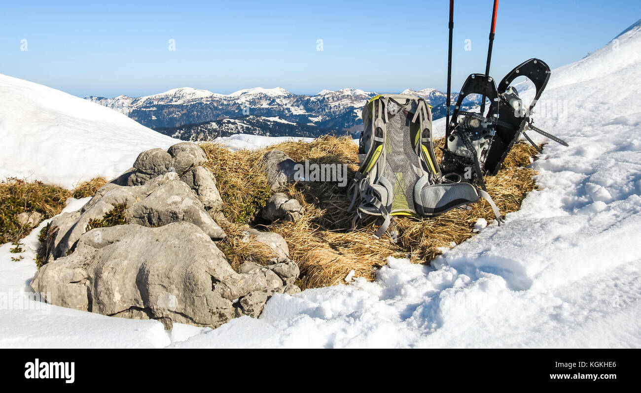 Winter hiking equipment. Backpack and snowshoes on top of mountain Stock Photo Alamy