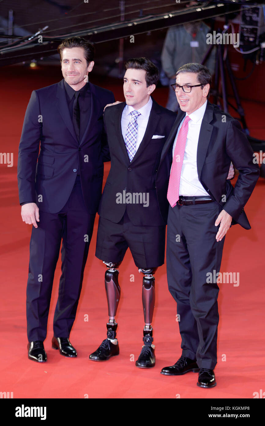 ROME, ITALY - OCTOBER 28: Jake Gyllenhaal, Jeff Bauman and Antonio Monda walks a red carpet for 'Stronger' during the 12th Rome Film Fest at Auditoriu Stock Photo
