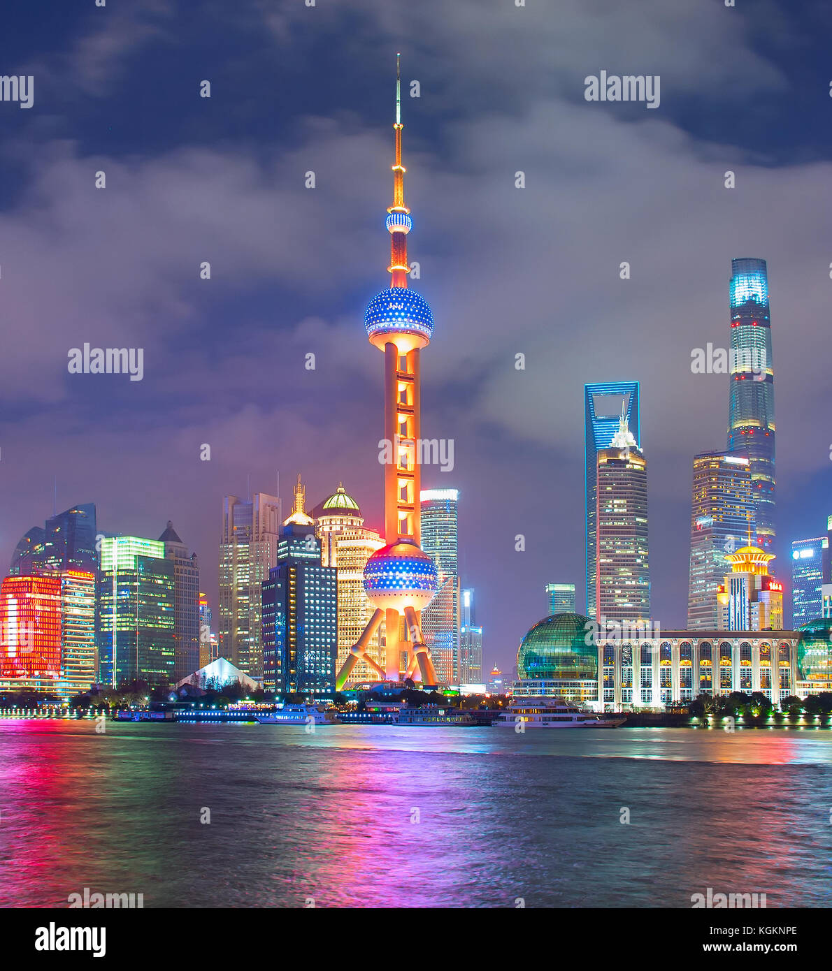 View of Shanghai Downtown at night with reflection in the river Stock Photo