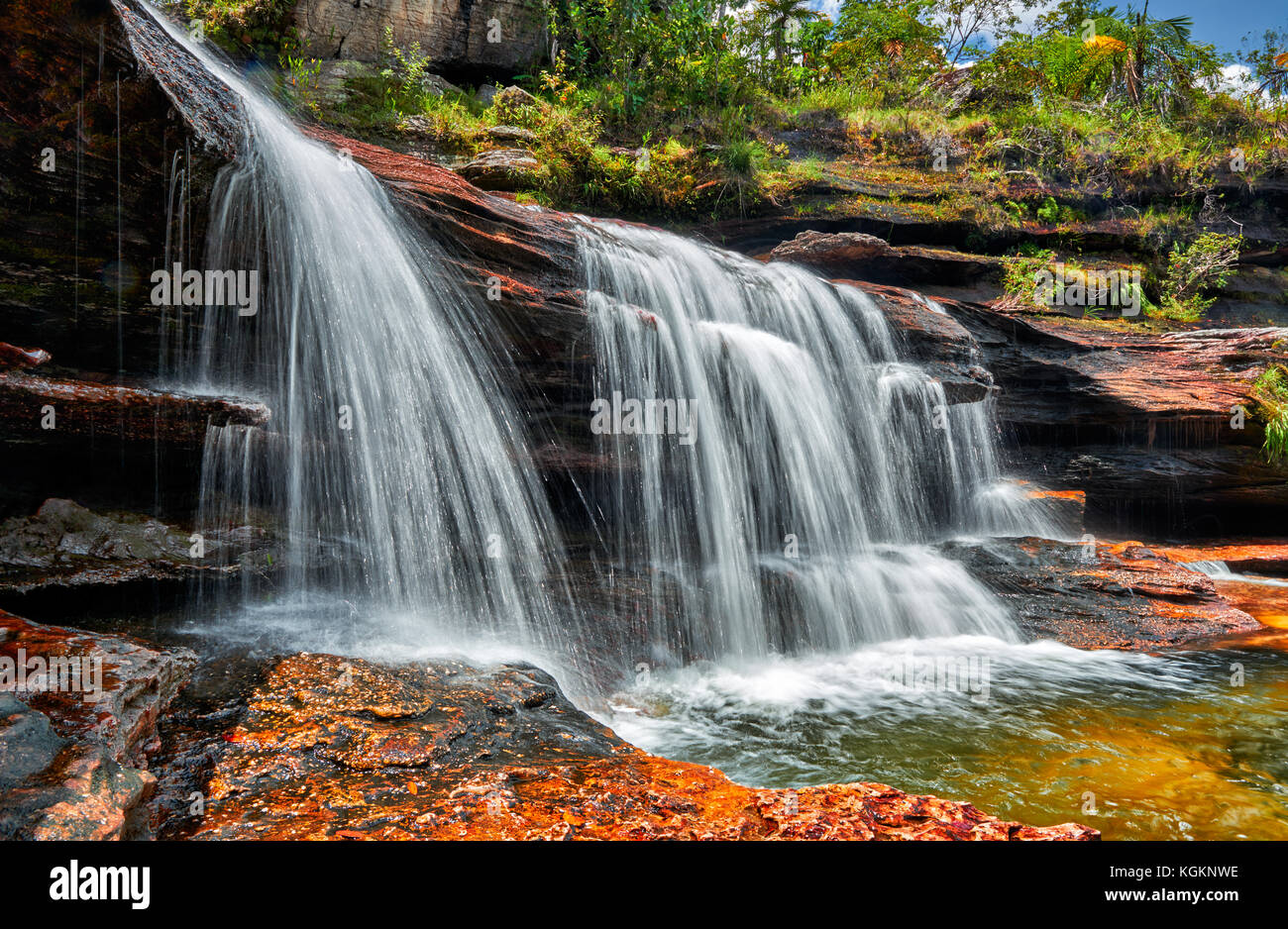 a waterfall at Cano Cristales called the 'River of Five Colors' or the 'Liquid Rainbow', Serrania de la Macarena, La Macarena, Colombia, South America Stock Photo