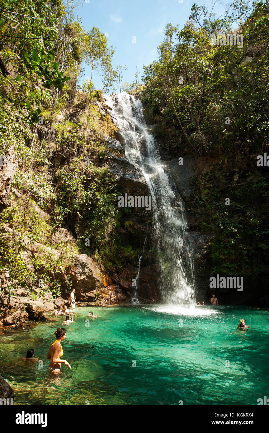 Tourists enjoying a swim at Santa Barbara waterfall, Chapada dos Veadeiros National Park, Goiás State, Brazil Stock Photo