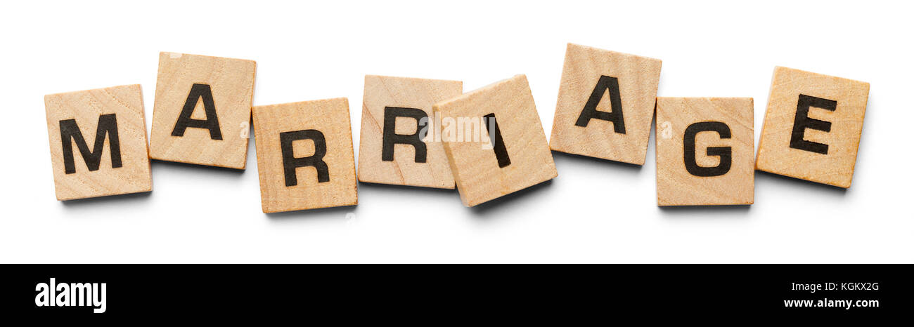 Marriage Spelled with Wood Tiles Isolated on a White Background. Stock Photo