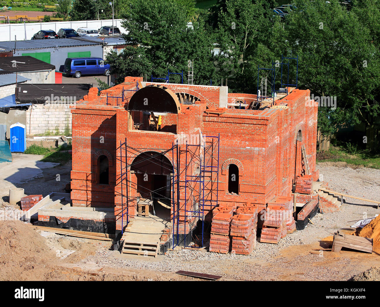 Construction of a building from red brick Stock Photo