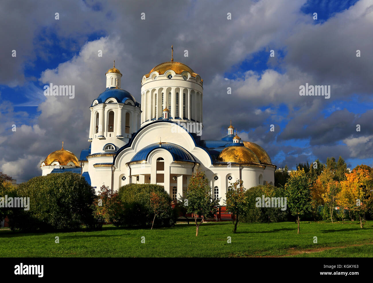 Golden domes of the Orthodox church in the background of the cloudy ...