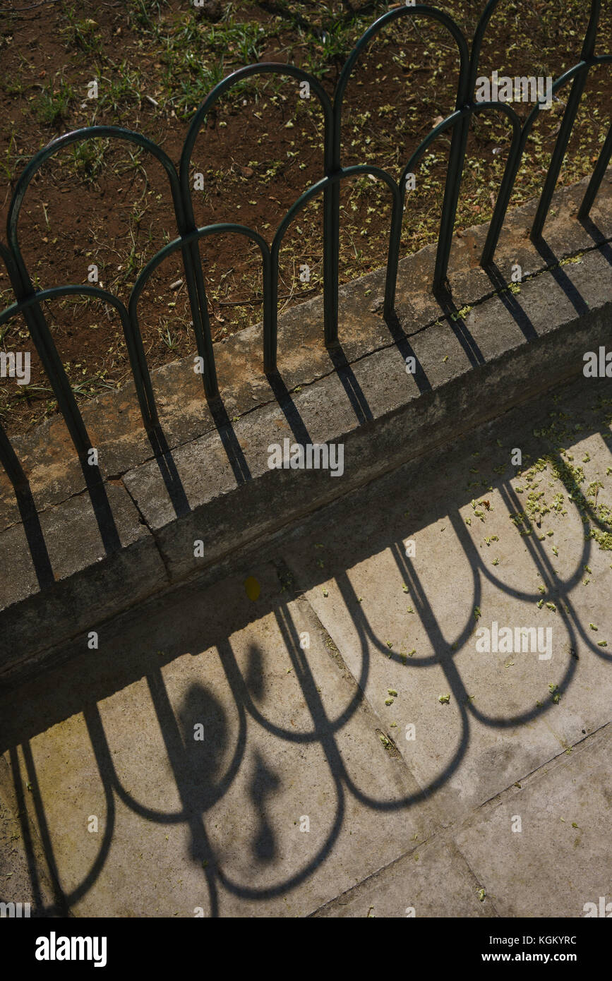 High angle view of railing at park on sunny day Stock Photo