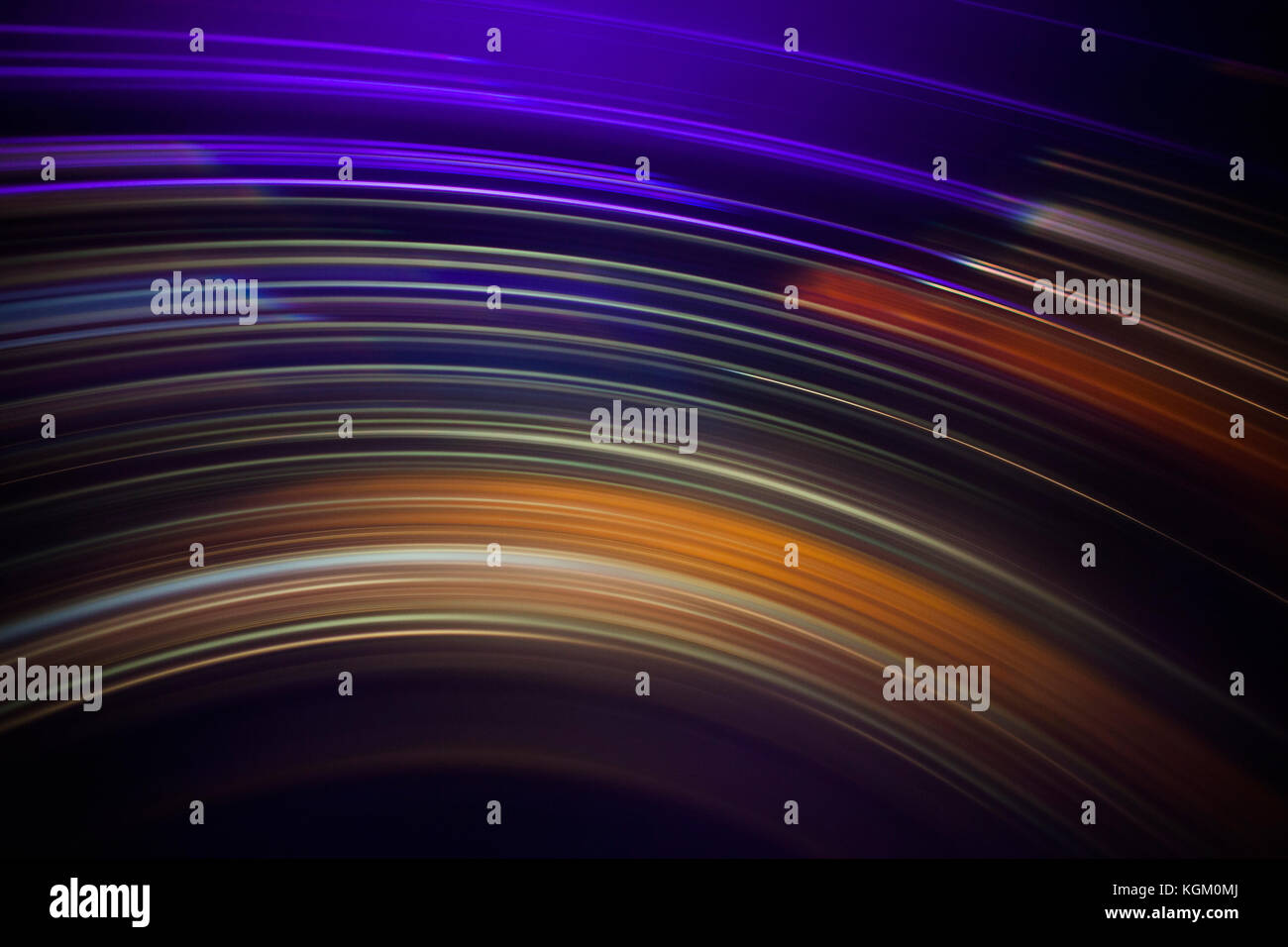 Abstract light trails yellow and blue hi-res stock photography and ...