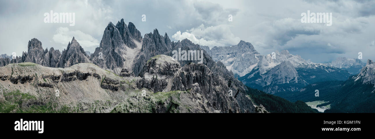 Panoramic view of rocky mountains against cloudy sky, South Tyrol, Italy Stock Photo