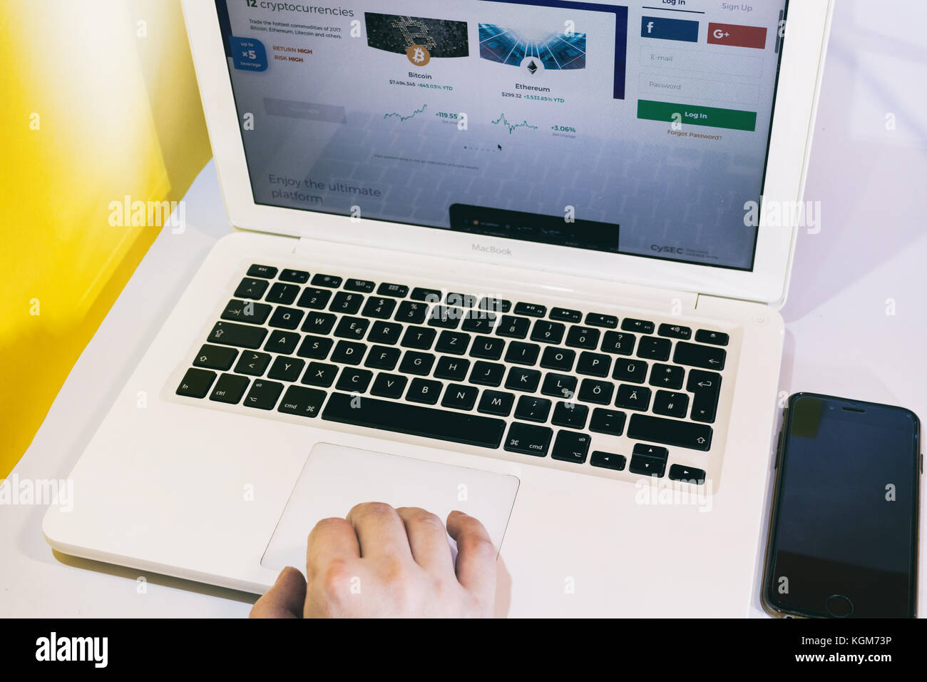 Young Men using a MacBook, browsing the internet for Crypto currency  trading, Vienna Austria 9.11.2017 Stock Photo - Alamy