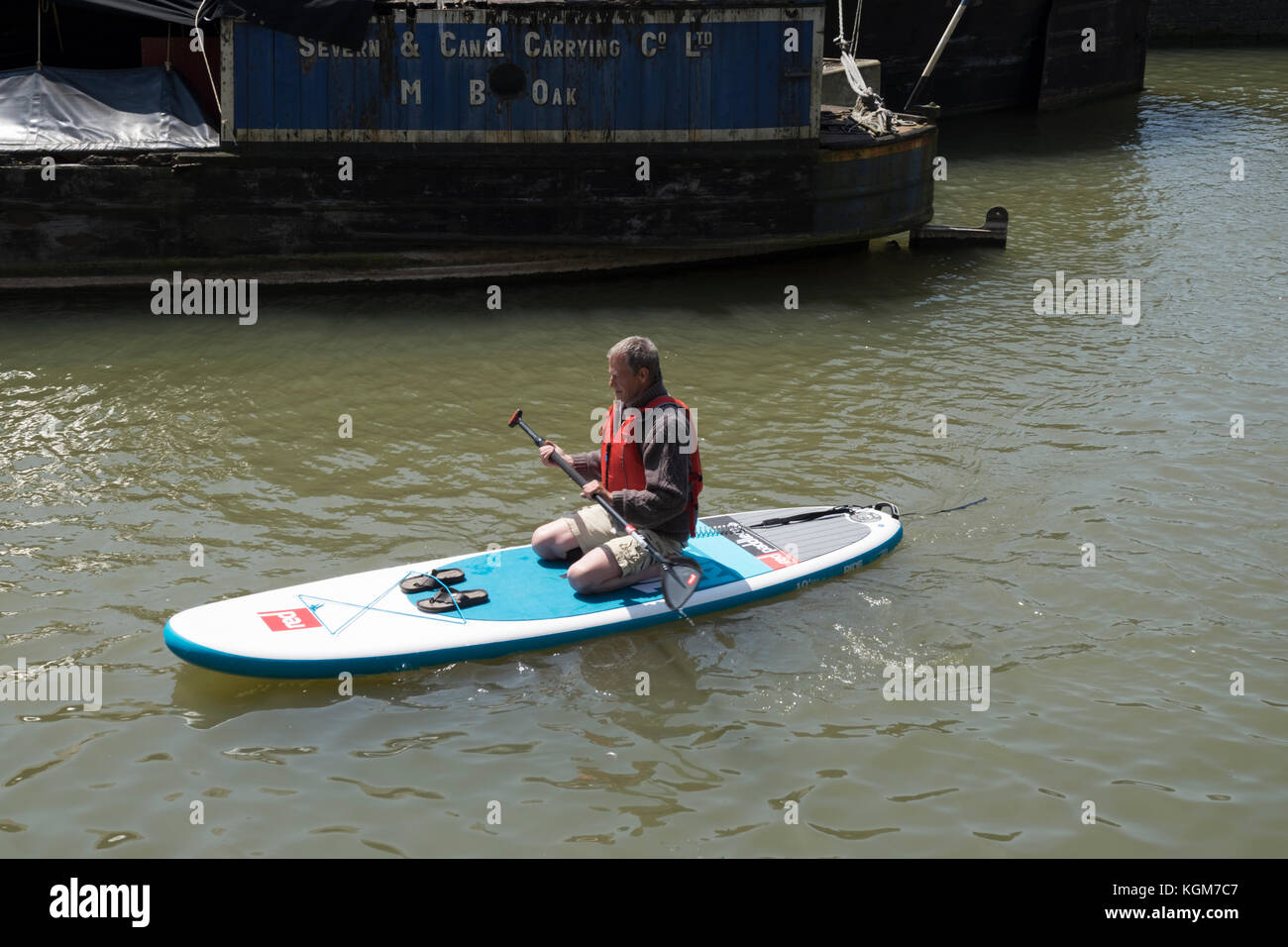 Paddleboarding in the Barge Arm at Gloucester Docks Stock Photo Alamy