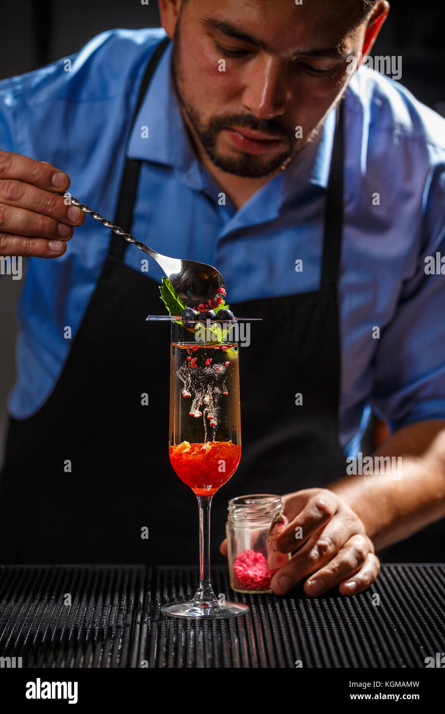 Bartender preparing fancy champagne cocktai Stock Photo