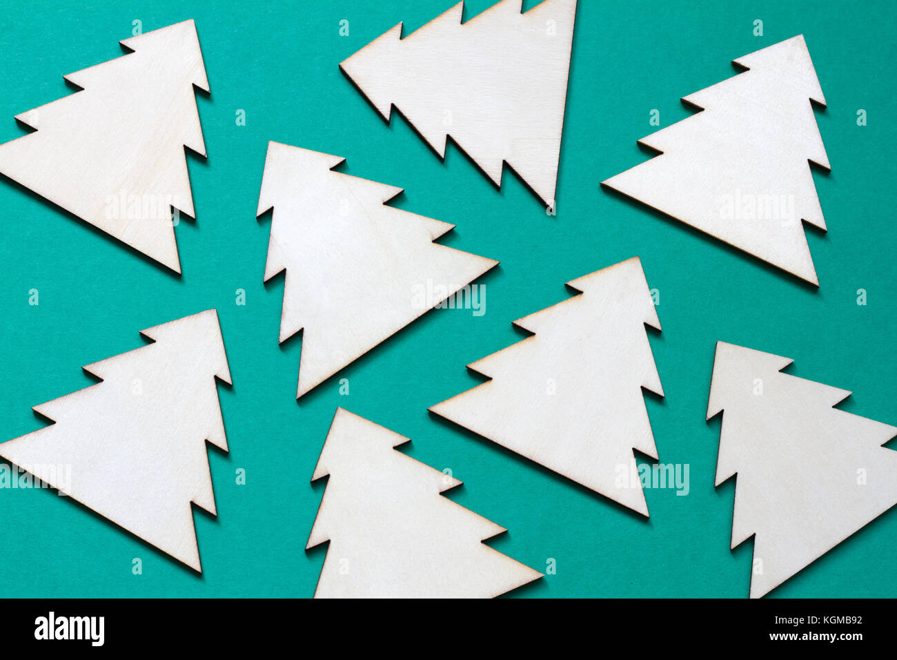 Christmas wooden tree on paper green abstract background Stock Photo ...