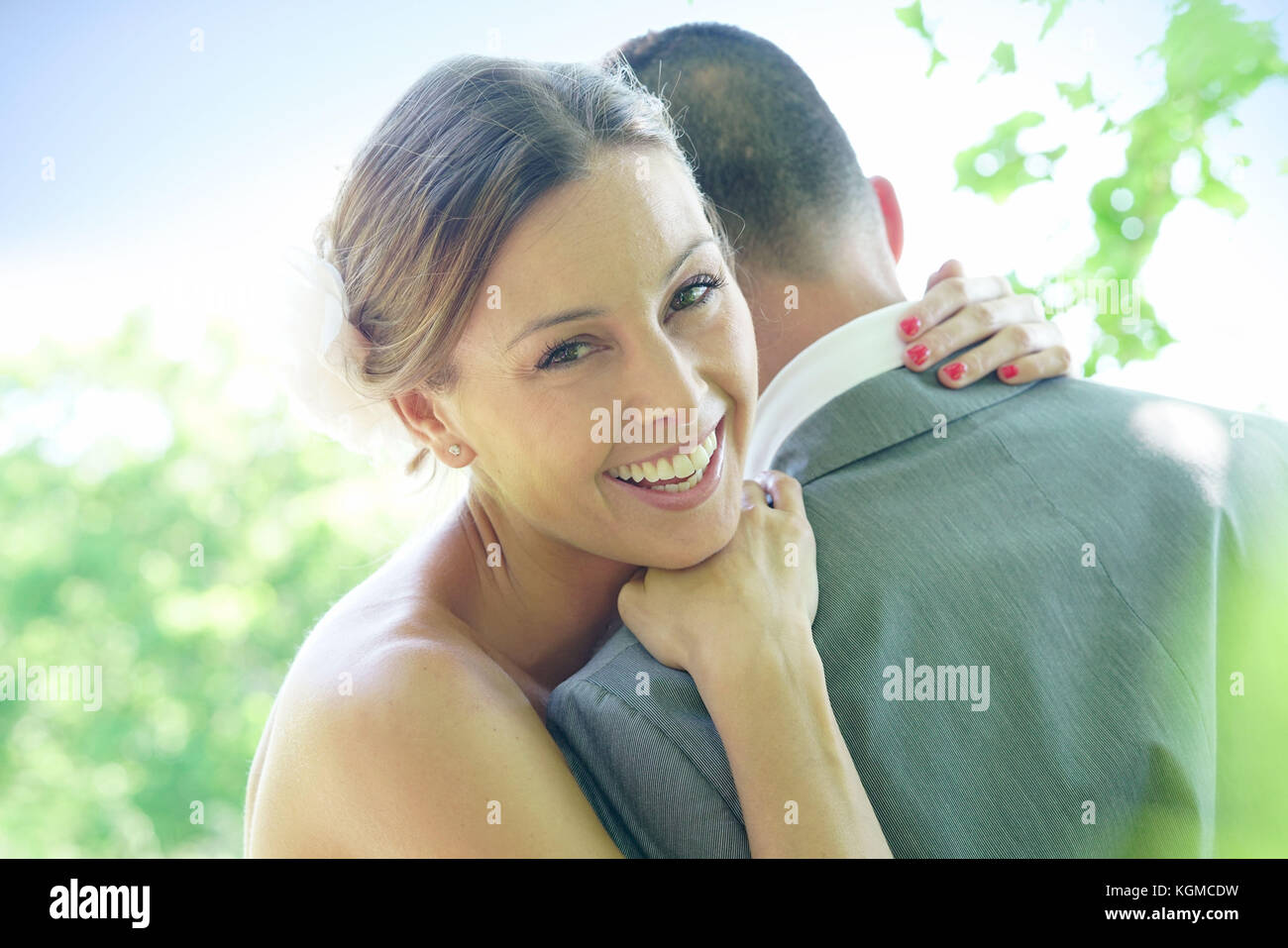 Woman arms around man wedding hi-res stock photography and images - Alamy