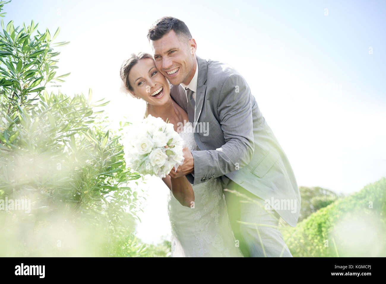 Happy married couple on their wedding day Stock Photo - Alamy
