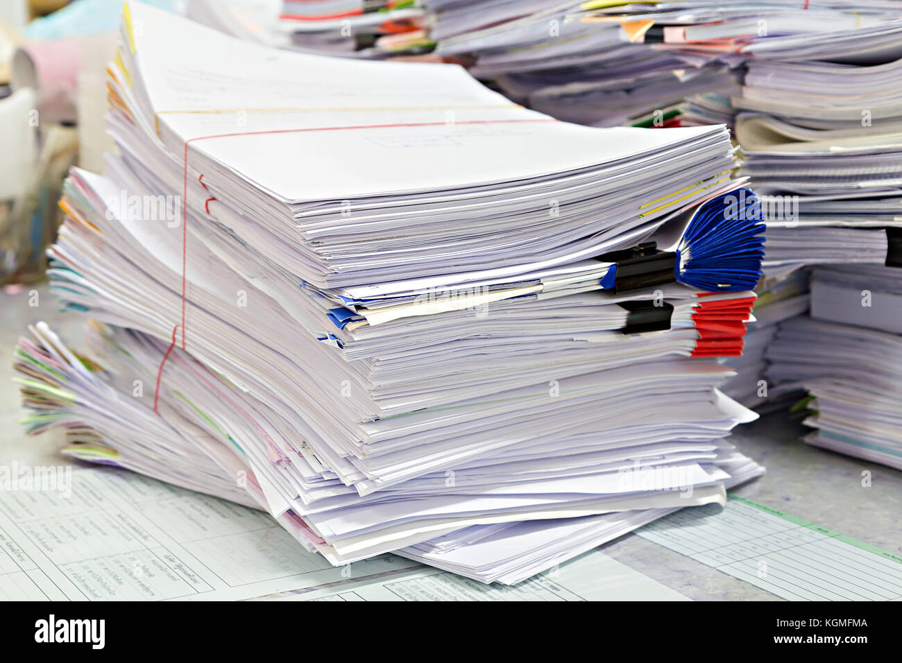 Close up of business documents stack on desk , report papers stack