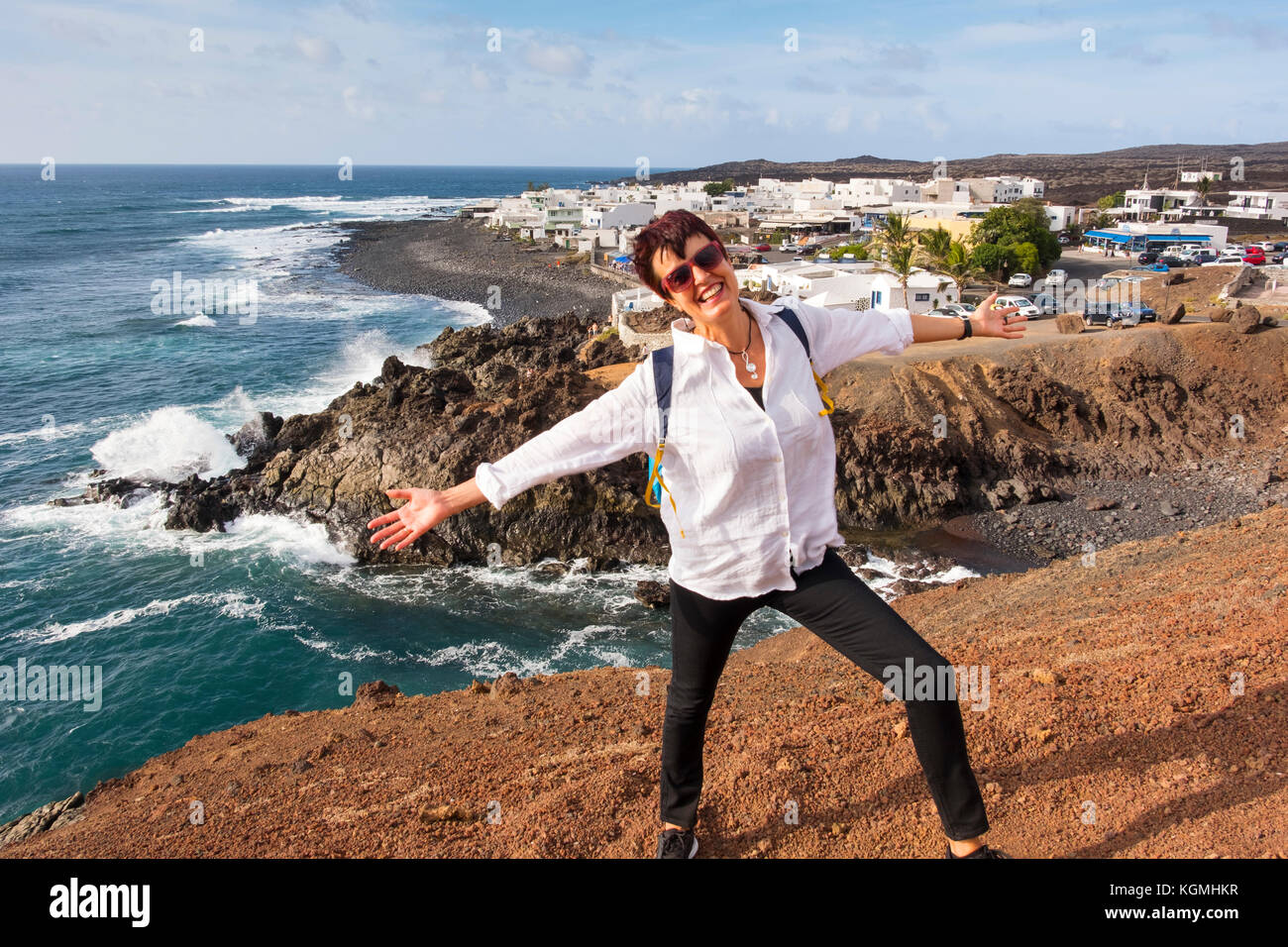 Tourist woman. Fishing village, El Golfo. Lanzarote Island. Canary Islands Spain. Europe Stock Photo