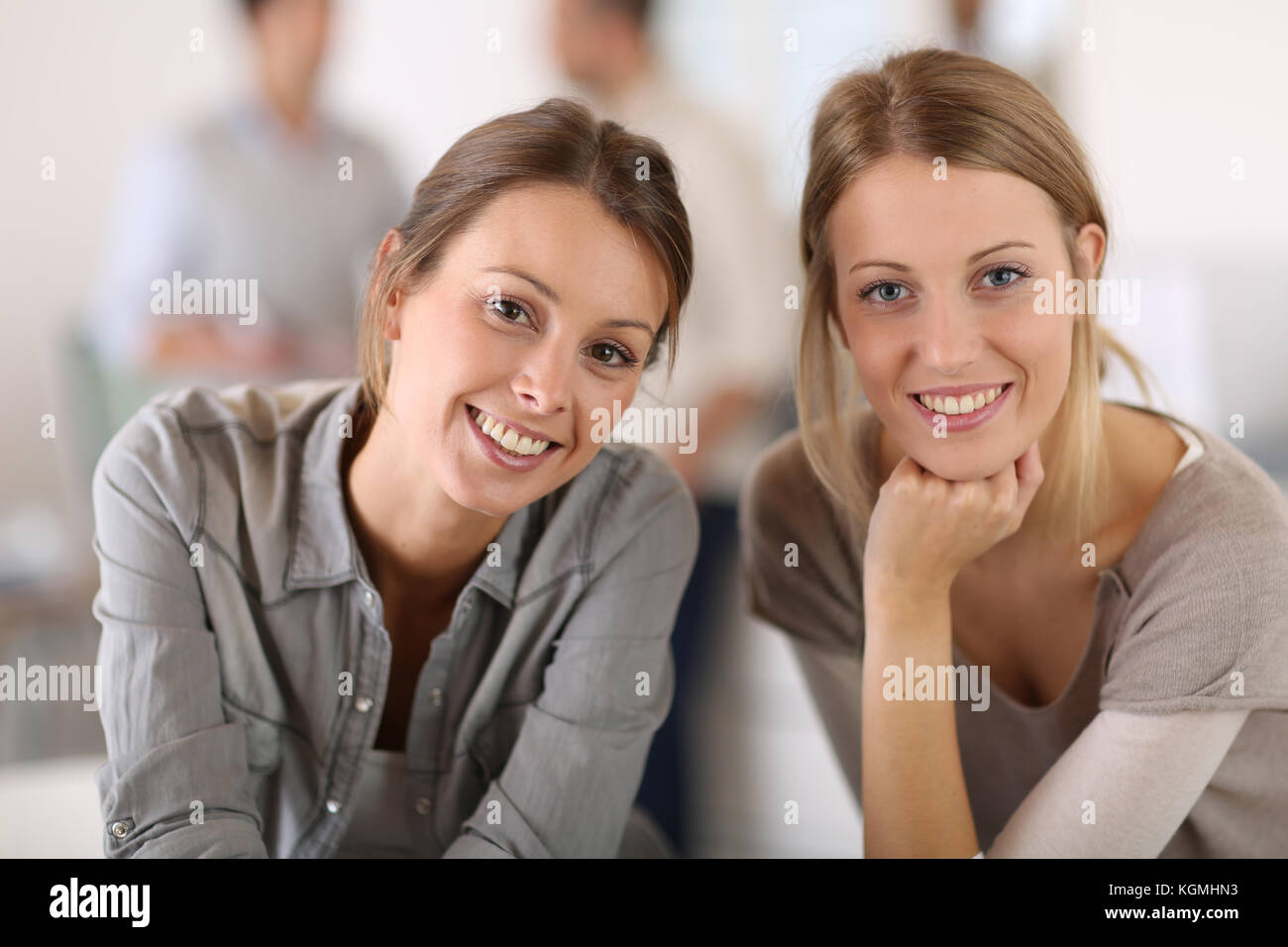 Portrait of working girls in office Stock Photo Alamy