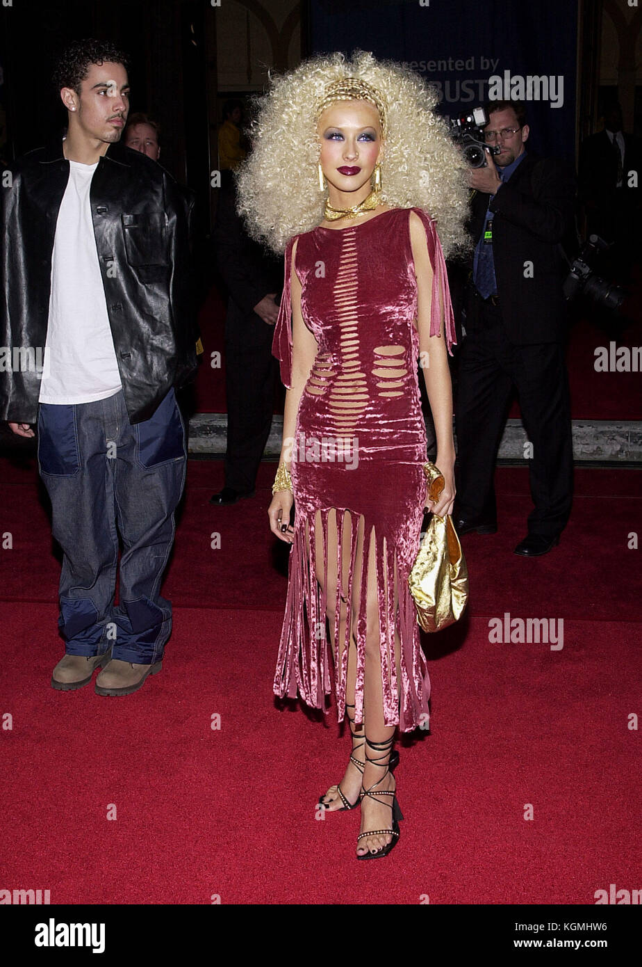 Christina Aguilera arriving at the 7th Annual Blockbuster Entertainment Awards  at the Shrine Auditorium in Los Angeles  4/10/2001 Christina Aguilera 099  = People, Vertical, Full Length, USA, California, City Of Los Angeles, One Person,  Portrait, Photography, Christina Aguilera, Arts Culture and Entertainment, Looking at the Camera, Christina Aguilera 099  = People, Vertical, Full Length, USA, California, City Of Los Angeles, One Person,  Portrait, Photography, Christina Aguilera, Arts Culture and Entertainment, Looking at the Camera, Wavy Hair Stock Photo