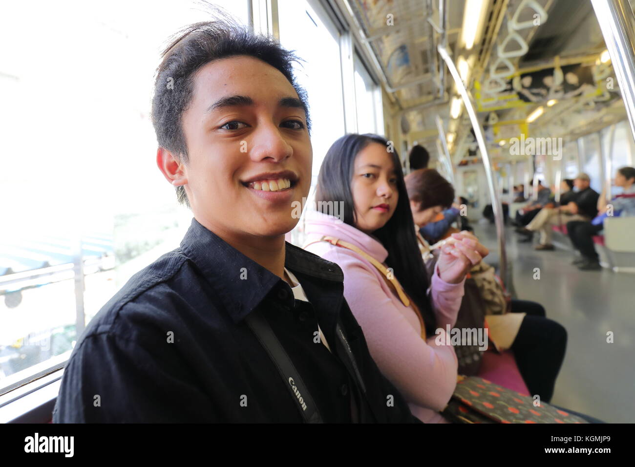 Foreigners Passenger in Japan Transport Train. Model Release for the Main Two People are OK