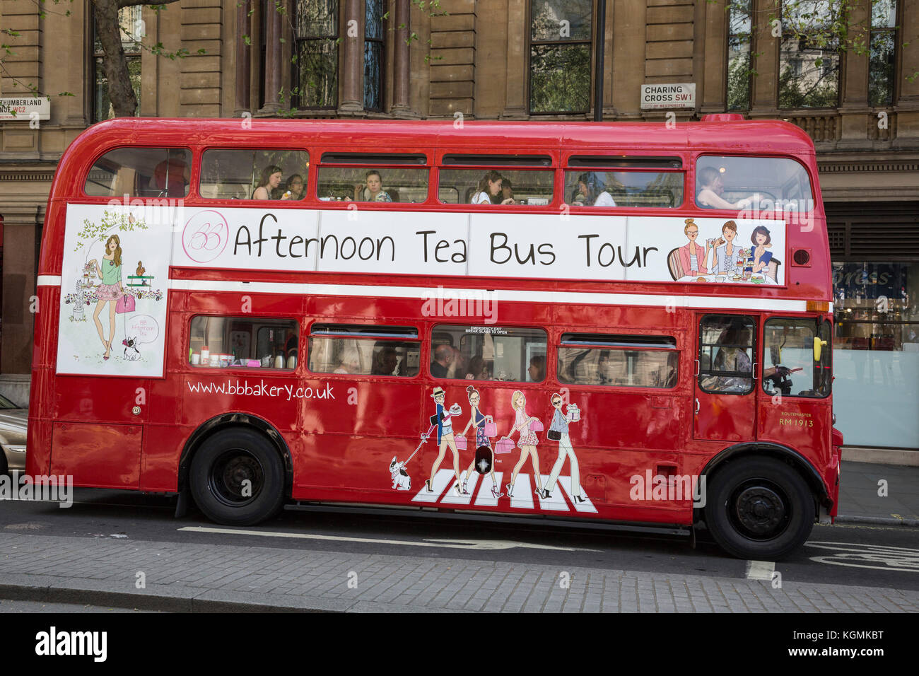 Red double decker London bus offering an afternoon tea bus tour, sightseeing, London, England, United Kingdom Stock Photo