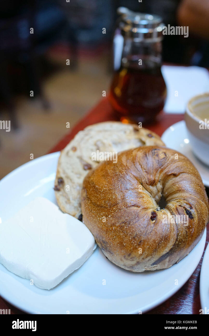 Cinnamon bagel with cream cheese Stock Photo Alamy