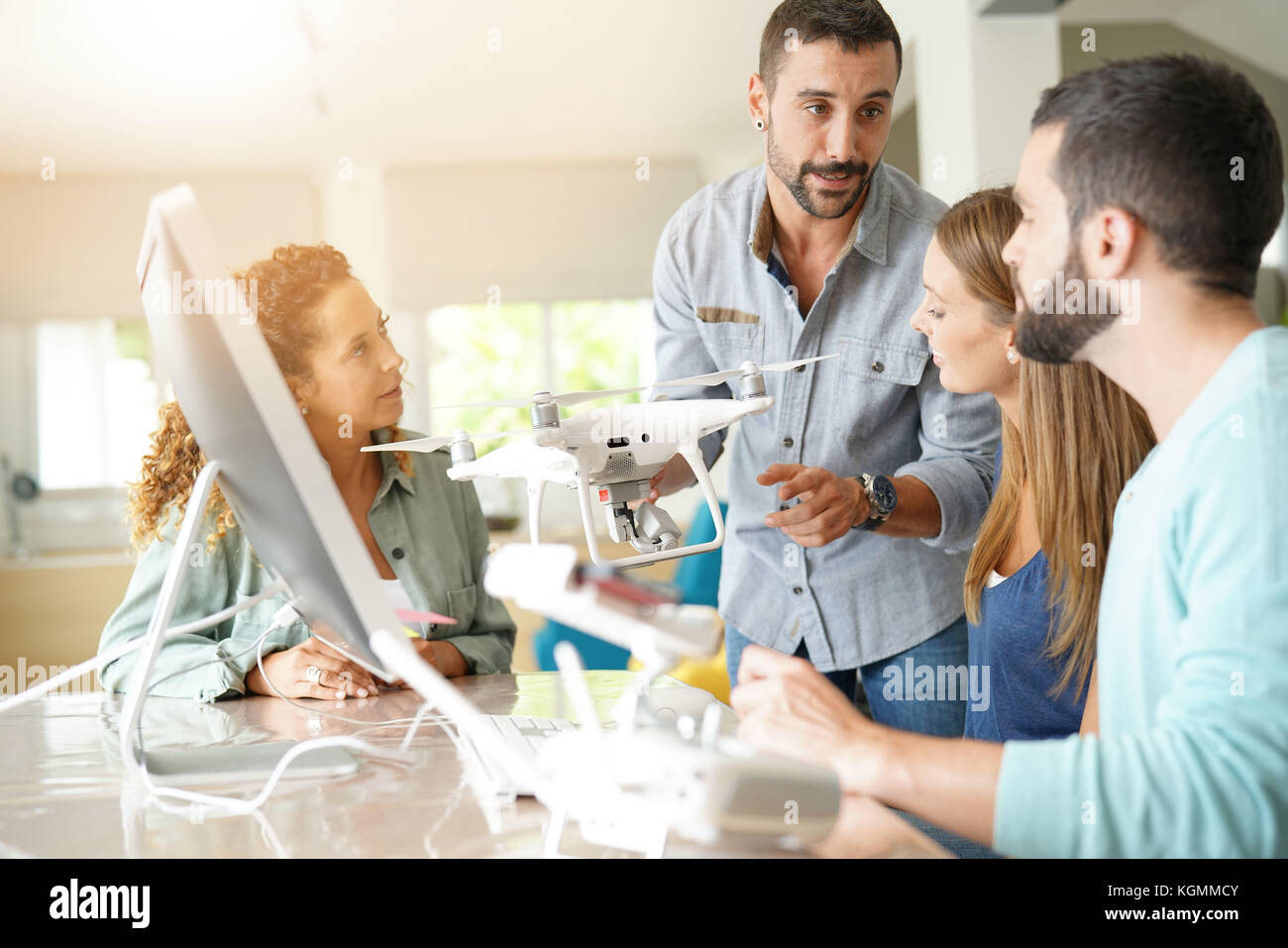 Startup people in office working on drone technology Stock Photo - Alamy