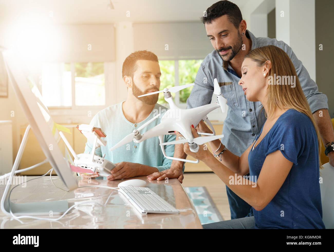 Startup people in office working on drone technology Stock Photo - Alamy