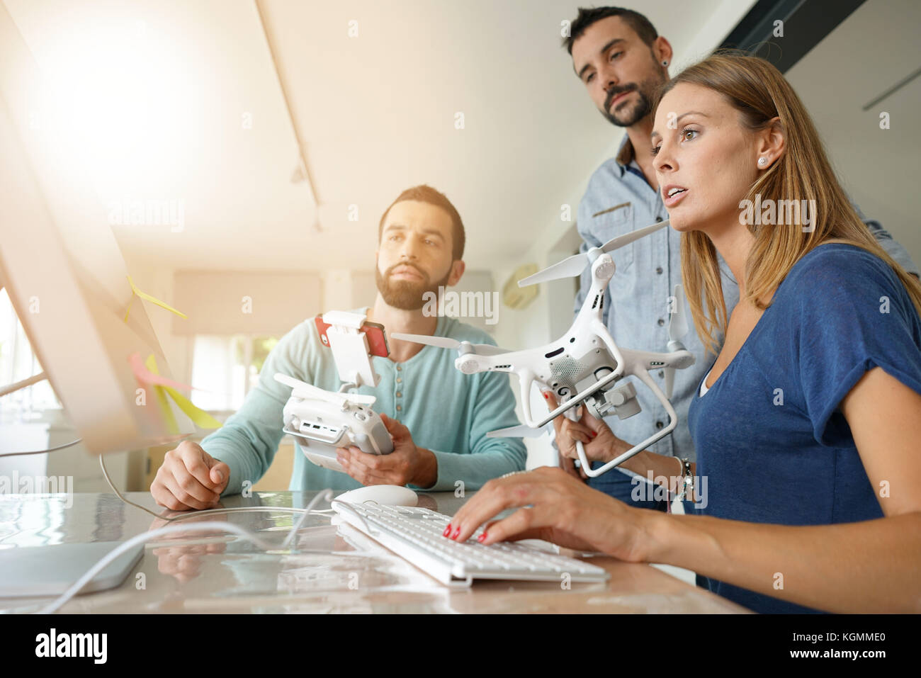 Startup people in office working on drone technology Stock Photo - Alamy