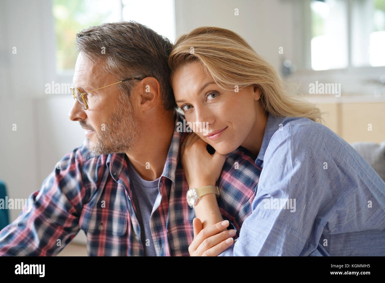 Portrait of mature couple relaxing at home Stock Photo - Alamy