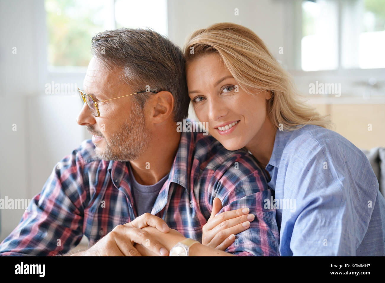 Portrait of mature couple relaxing at home Stock Photo - Alamy