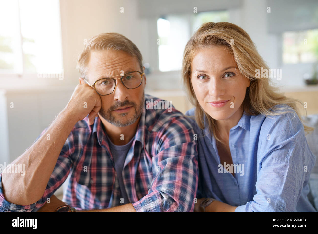Portrait of mature couple relaxing at home Stock Photo - Alamy