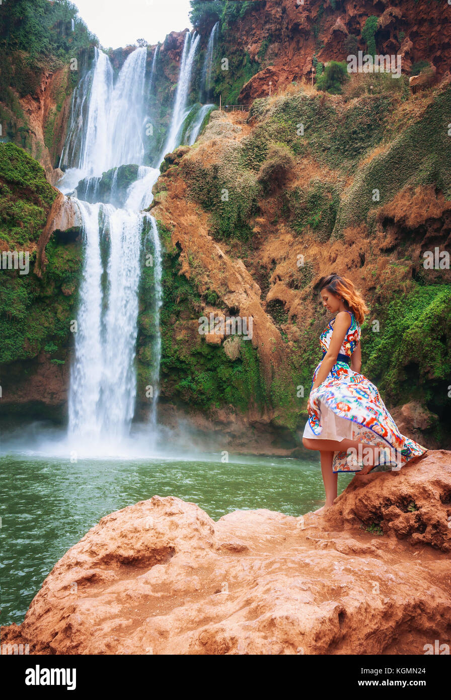 Girl In Front Of A Waterfall Stock Photo - Alamy