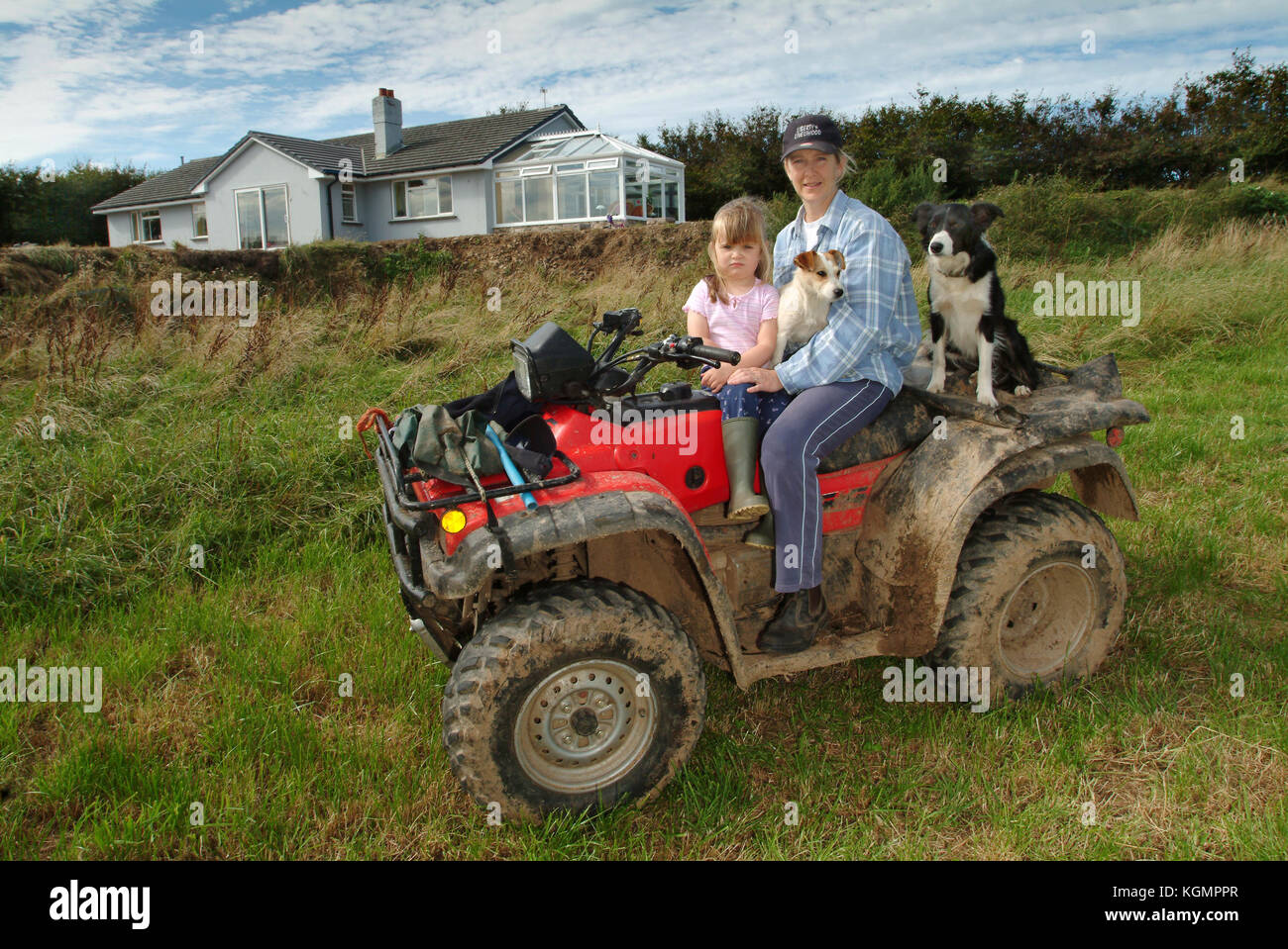 RELOCATION.  Lindsey Roberts with daughter Mary on their sheep farm in Parracombe, North Devon. Stock Photo
