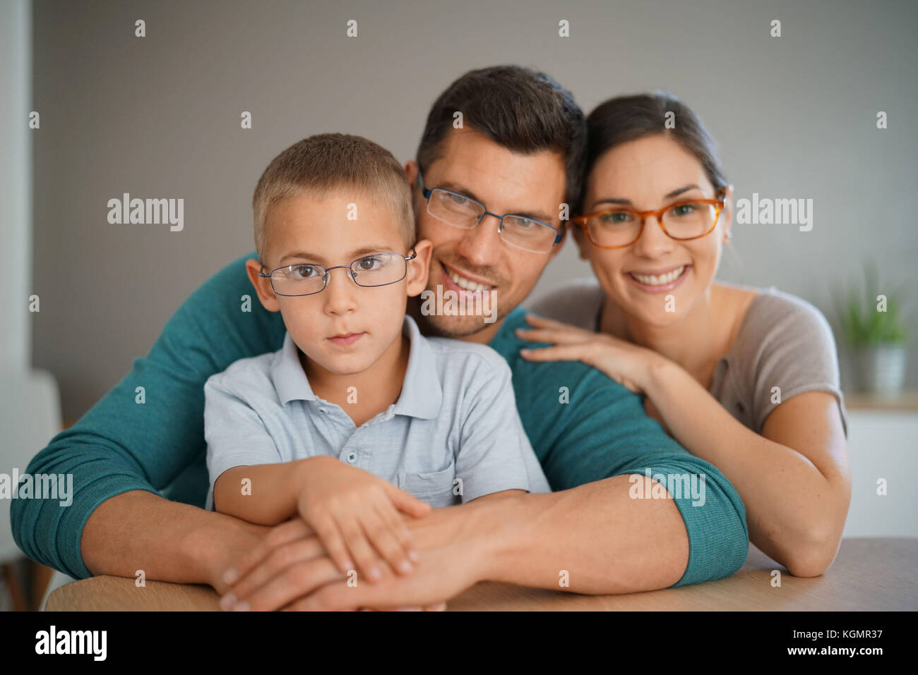 Family of three people wearing eyeglasses Stock Photo