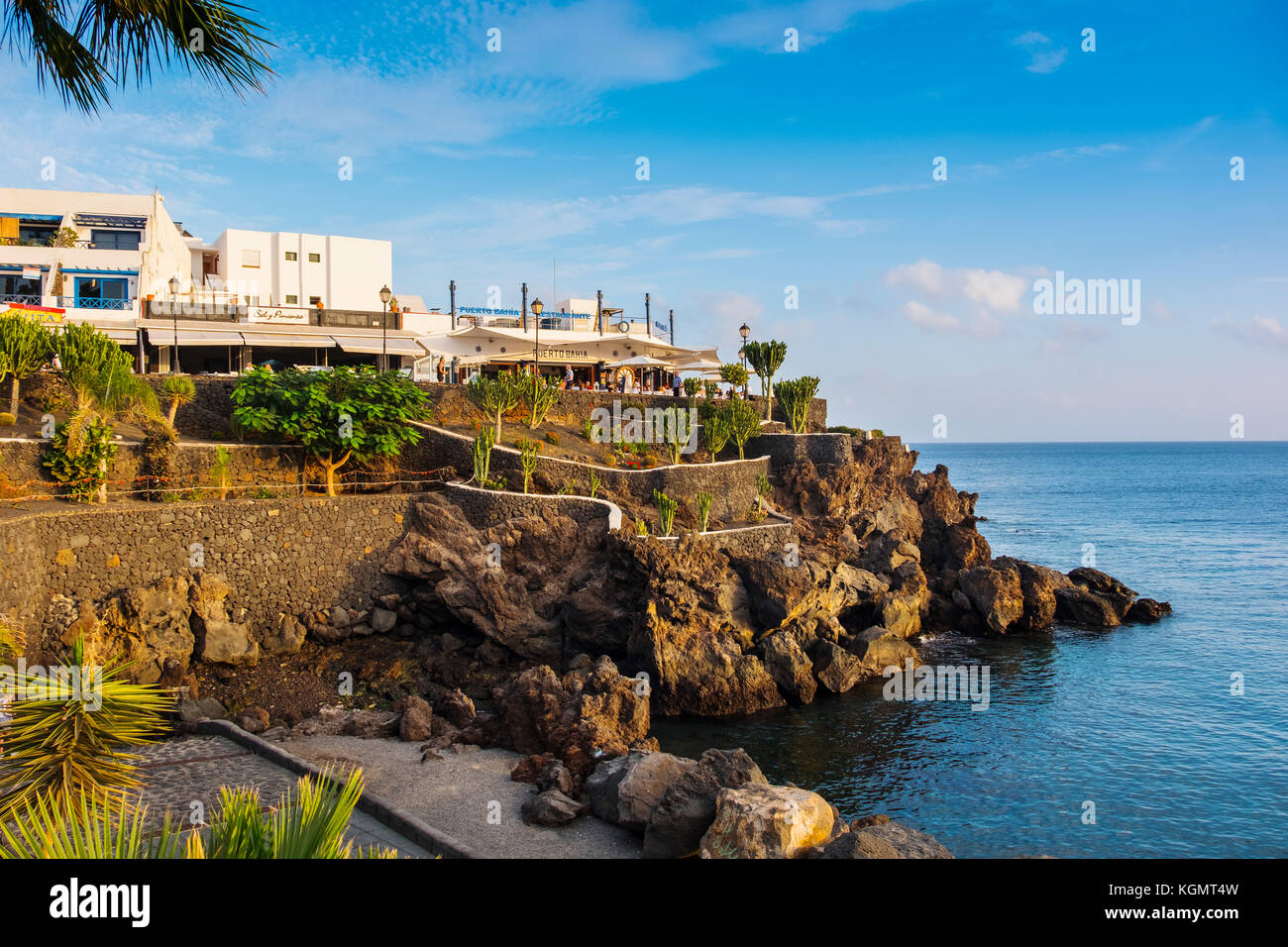Restaurant at sunset, fishing port, Puerto del Carmen. Lanzarote Island. Canary Islands Spain. Europe Stock Photo