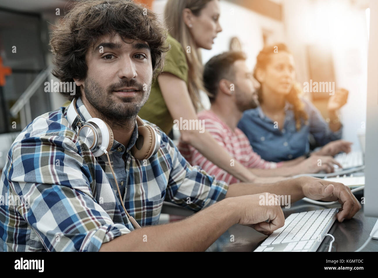 Startup entrepreneur working on desktop in office Stock Photo - Alamy