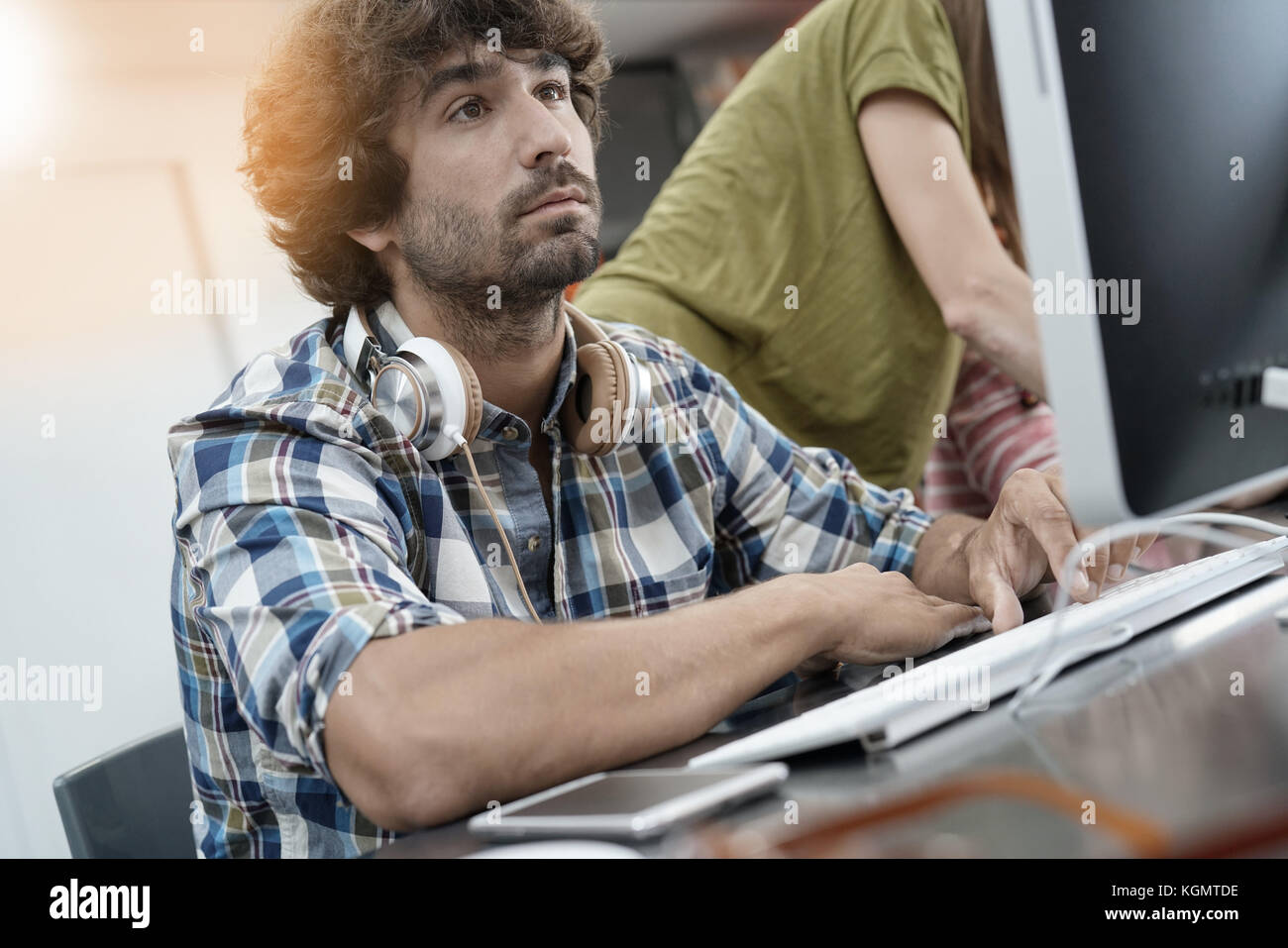 Startup entrepreneur working on desktop in office Stock Photo - Alamy