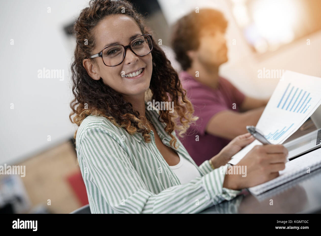 Young startup entrepreneur in office working on laptop Stock Photo - Alamy