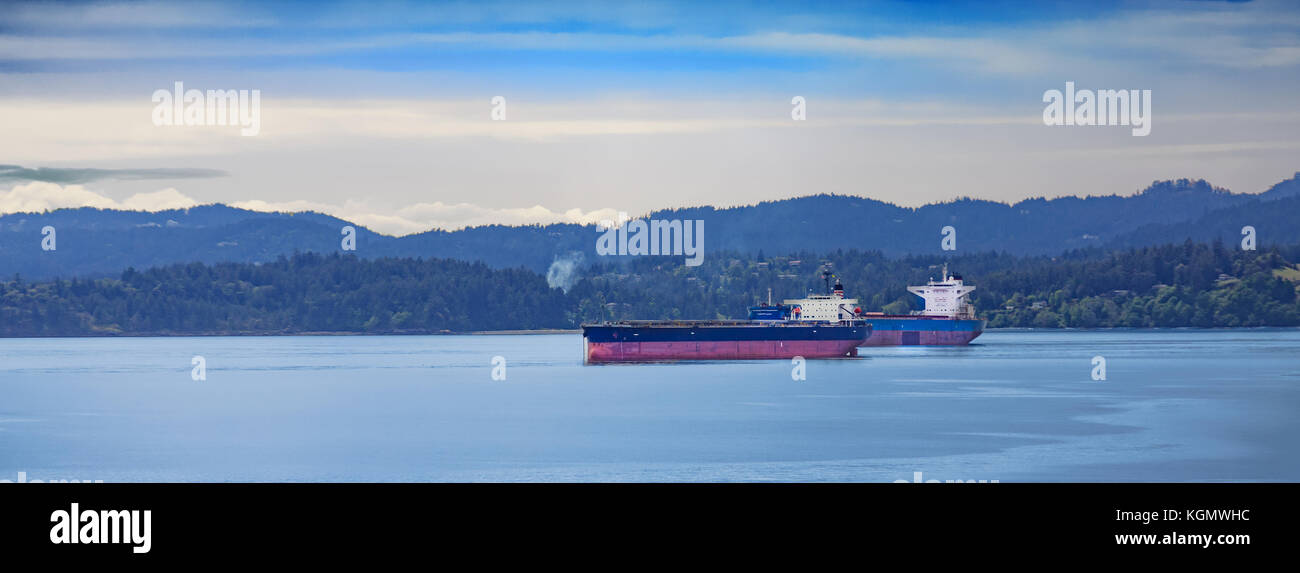 Two Tankers on Shore of British Columbia Stock Photo