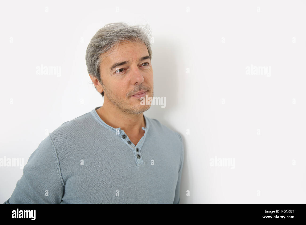 Mature handsome man standing on white background Stock Photo - Alamy