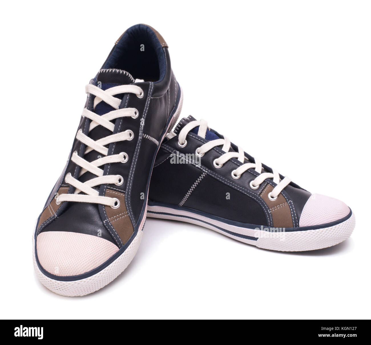 Pair of fashion leather sneakers isolated on white background with ...